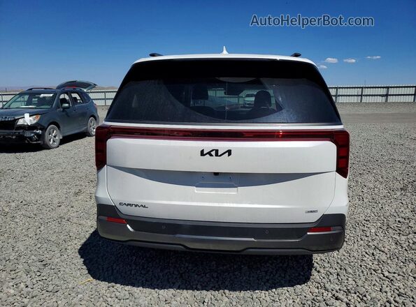 KNDNE5KA9T6144688 2026 KIA CARNIVAL White Rear view