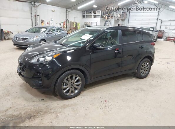KNDP6CAC0M7886096 2021 KIA SPORTAGE Black Front left