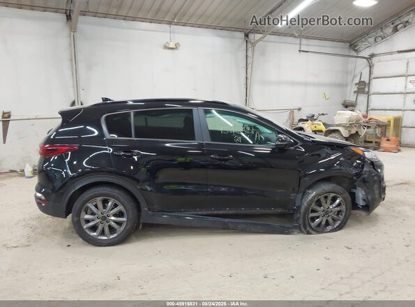KNDP6CAC0M7886096 2021 KIA SPORTAGE Black Rear interior view