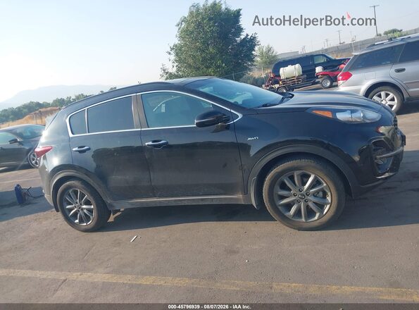 KNDP6CAC4L7664238 2020 KIA SPORTAGE Maroon Rear interior view