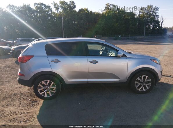 KNDPBCAC0G7878581 2016 KIA SPORTAGE Silver Rear interior view