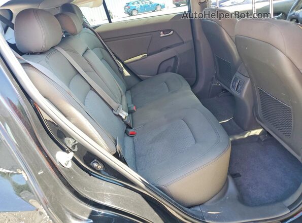 KNDPBCAC6G7869996 2016 KIA SPORTAGE Black Widok wnętrza z tyłu
