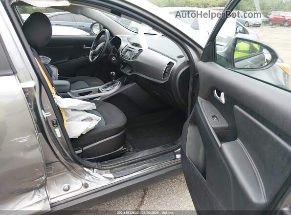 KNDPBCACXG7838606 2016 KIA SPORTAGE Gray Vista interior delantera