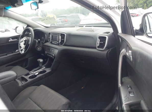 KNDPM3AC1K7562447 2019 KIA SPORTAGE White Widok wnętrza z przodu