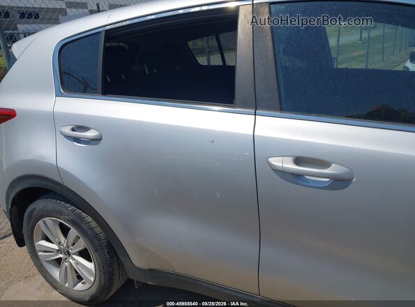 KNDPM3AC6H7106890 2017 KIA SPORTAGE Silver Rear interior view