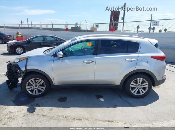 KNDPM3AC8J7391291 2018 KIA SPORTAGE Серебряный Вид задней части салона