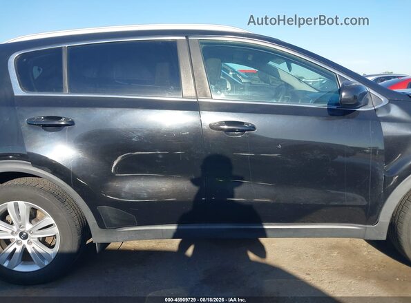 KNDPM3AC9H7233570 2017 KIA SPORTAGE Black Widok wnętrza z tyłu