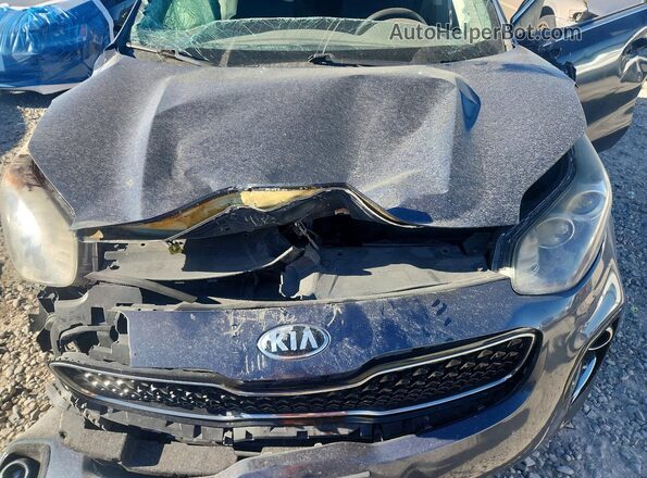 KNDPMCAC0H7224224 2017 KIA SPORTAGE Charcoal Vista interior trasera