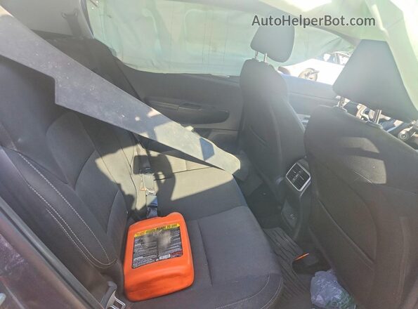 KNDPMCAC0H7224224 2017 KIA SPORTAGE Charcoal Vista de los asientos traseros