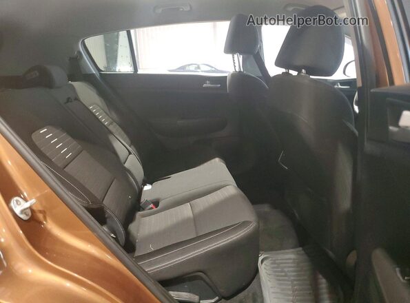 KNDPMCAC5L7707412 2020 KIA SPORTAGE Brown Widok wnętrza z tyłu