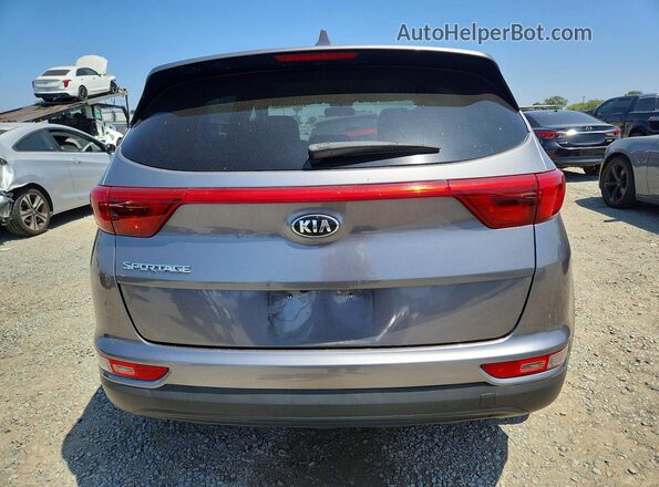 KNDPMCAC7J7340476 2018 KIA SPORTAGE Серый Вид сзади