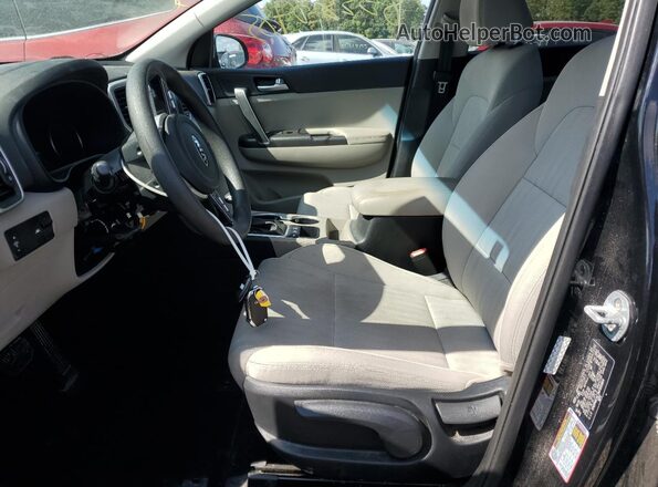 KNDPMCAC7M7850864 2021 KIA SPORTAGE Black Вид салону спереду