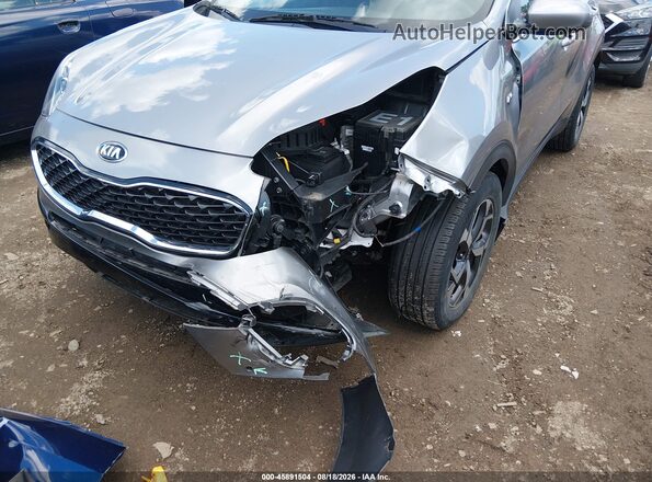 KNDPMCAC9M7938945 2021 KIA SPORTAGE Серый Вид спереди