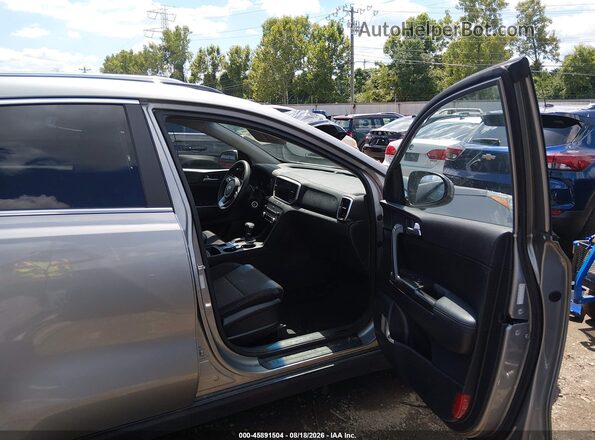 KNDPMCAC9M7938945 2021 KIA SPORTAGE Серый Вид салона спереди