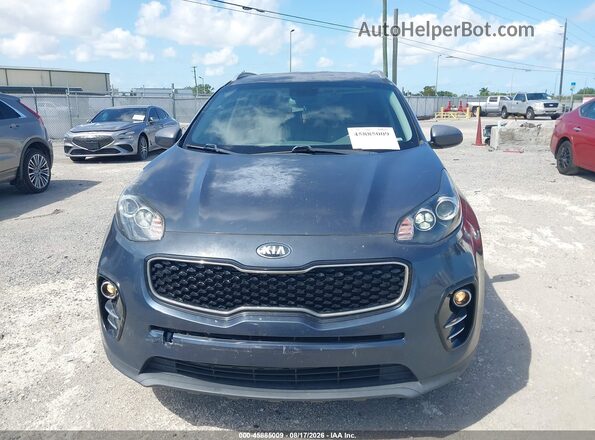 KNDPN3ACXH7175174 2017 KIA SPORTAGE Gray Widok wnętrza z tyłu