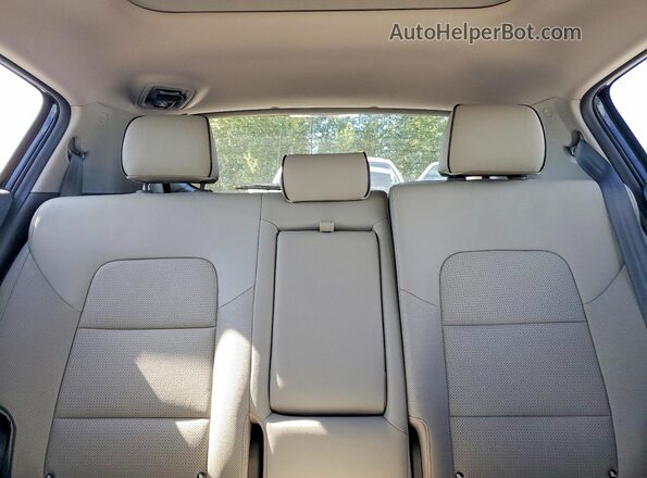 KNDPNCAC0J7328358 2018 KIA SPORTAGE Black Rear seats view