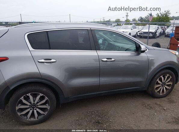 KNDPNCAC4H7238012 2017 KIA SPORTAGE Gray Սալոնի հետևի տեսք