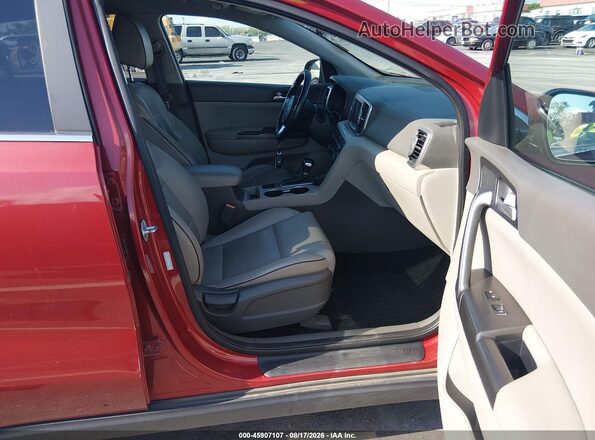 KNDPNCAC5H7275795 2017 KIA SPORTAGE Red Widok wnętrza z przodu