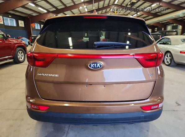 KNDPNCACXH7275842 2017 KIA SPORTAGE Brown Vista interior delantera
