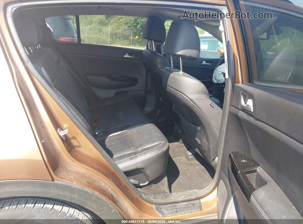 KNDPNCACXJ7318677 2018 KIA SPORTAGE Brown VIN კოდის სტიკერის ხედი