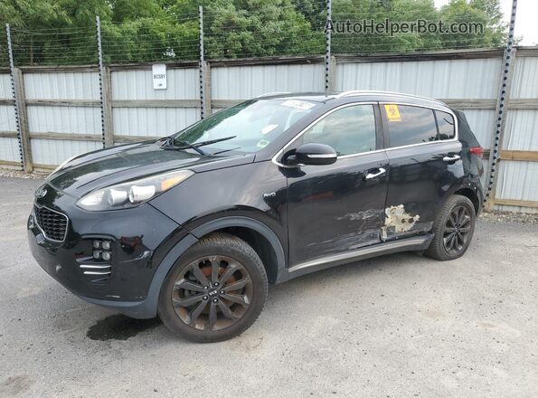 KNDPNCACXJ7411196 2018 KIA SPORTAGE Black Rear seats view