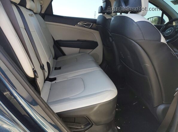 KNDPVCAGXP7106776 2023 KIA SPORTAGE Бирюзовый Вид задней части салона