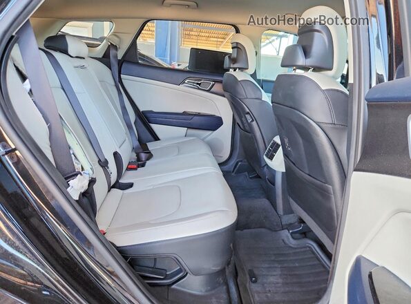 KNDPVCDG1R7142502 2024 KIA SPORTAGE Black Rear interior view