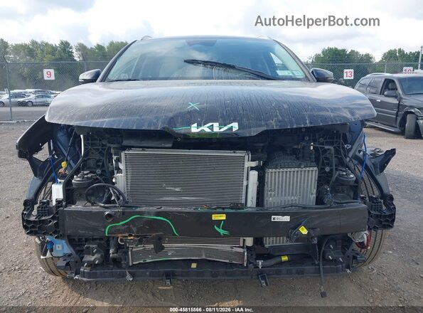 KNDPVDDG2T7266646 2026 KIA SPORTAGE HYBRID Black Вид задньої частини салону