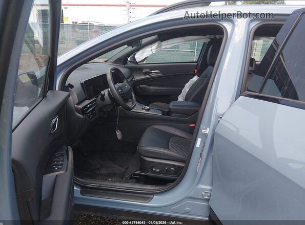 KNDPVDDG6T7305156 2026 KIA SPORTAGE HYBRID Light Blue წინა სალონის ხედი
