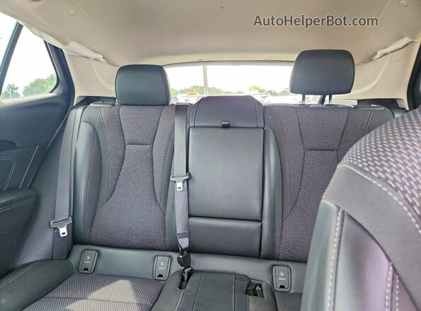 LRBAZLR47PD039770 2023 BUICK ENVISION Red Vista de los asientos traseros