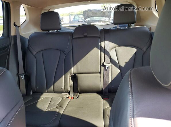 LRBFXFSX7GD188424 2016 BUICK ENVISION Red Rear seats view