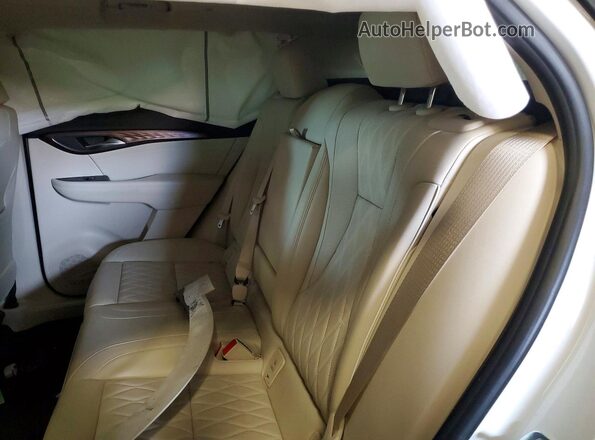 LRBFZSR49PD189315 2023 BUICK ENVISION White Widok tylnych siedzeń