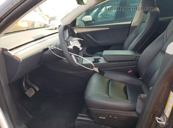 LRWYGDFD3PC057864 2023 TESLA MODEL Charcoal Front interior view