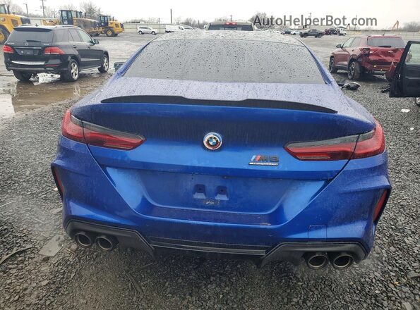 NJ1493E 2023 BMW M8 Blue Rear view