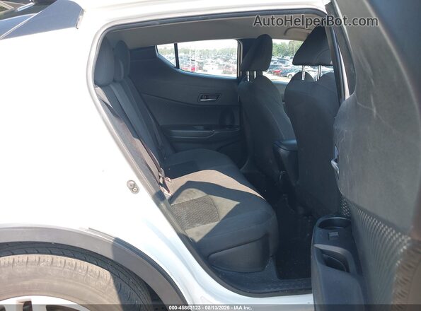 NMTKHMBX0LR104832 2020 TOYOTA C-HR White VIN կոդի պիտակի տեսք