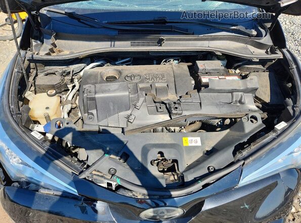 NMTKHMBX5JR035584 2018 TOYOTA C-HR Black Vista interior trasera