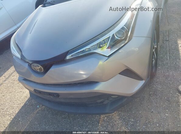 NMTKHMBX5JR046780 2018 TOYOTA C-HR Silver ხელსაწყოთა პანელის ხედი