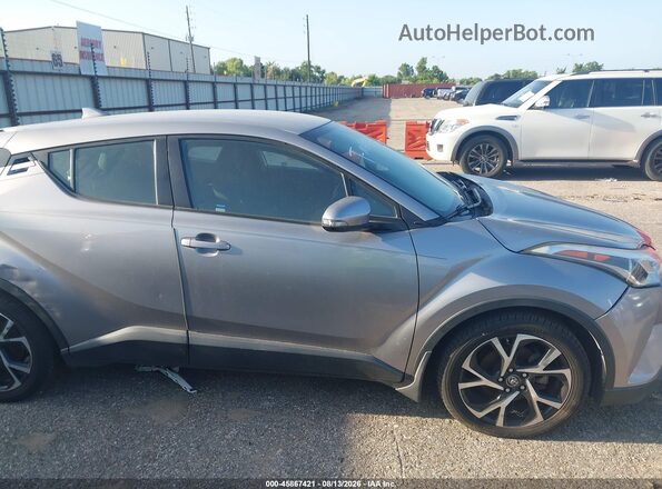 NMTKHMBX5JR046780 2018 TOYOTA C-HR Silver უკანა სალონის ხედი