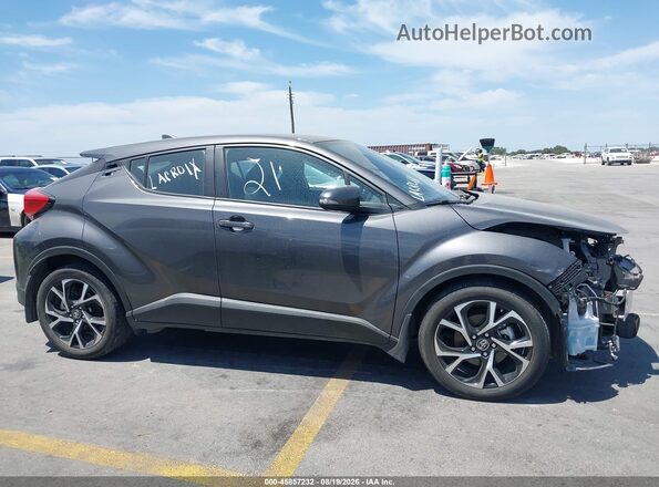 NMTKHMBXXJR031045 2018 TOYOTA C-HR Gray Vista interior trasera