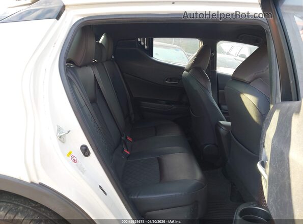 NMTKHMBXXKR095023 2019 TOYOTA C-HR White Вид наклейки з VIN-кодом