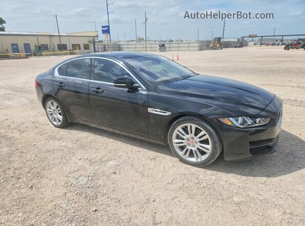 SAJAD4GX8KCP49070 2019 JAGUAR XF Черный Передняя правая четверть