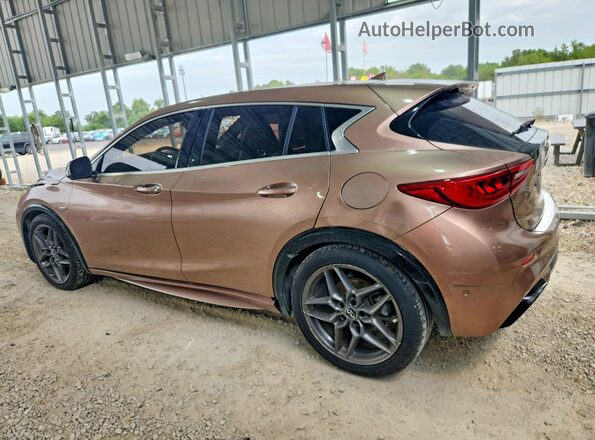 SJKCH5CP8HA032581 2017 INFINITI QX30 Pink Rear left