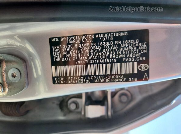 VNKKTUD31HA075119 2017 TOYOTA YARIS Silver VIN sticker view