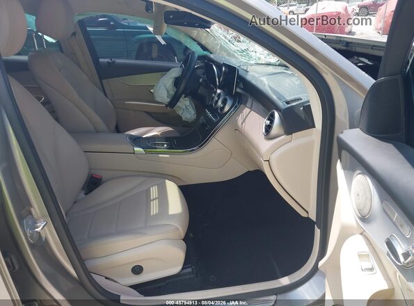 W1N0J8EB7MF934710 2021 MERCEDES-BENZ GLC 300 COUPE Gold წინა სალონის ხედი
