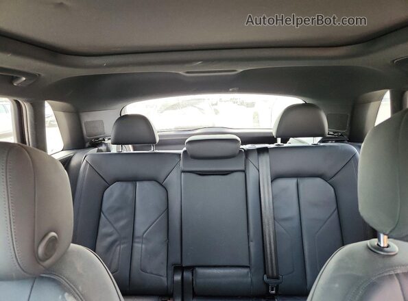 WA1AECF35L1006703 2020 AUDI Q3 Silver Rear seats view