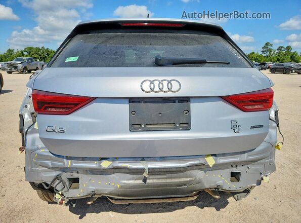 WA1AECF35L1006703 2020 AUDI Q3 Silver Rear view