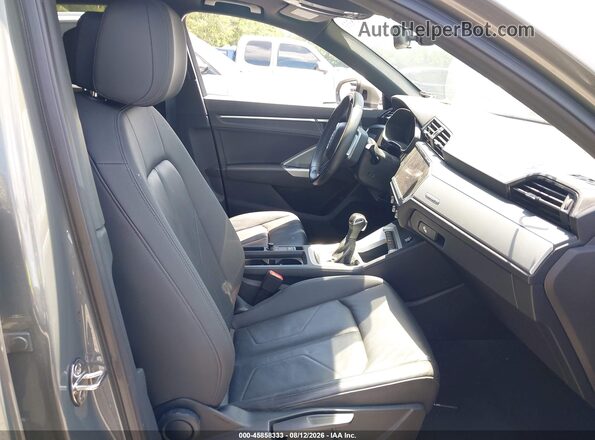 WA1AECF38L1034544 2020 AUDI Q3 Pewter Front interior view