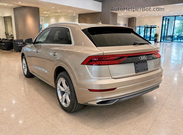 WA1BVAF14KD008818 2019 AUDI Q8 Золотой Передняя правая четверть