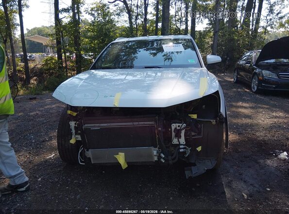 WA1EECF34L1047163 2020 AUDI Q3 White Սալոնի հետևի տեսք