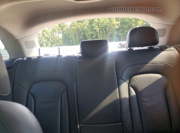 WA1EFCFSXGR001557 2016 AUDI Q3 Black Rear seats view